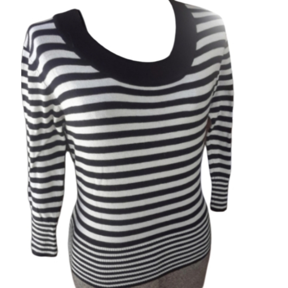 Size  M Etam striped white an black sweater